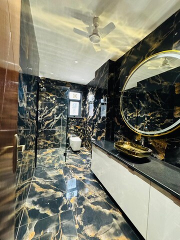 Kitchen in 4 BHK Builder Floor at Ansal Versalia Phase A2, Sector 67a – for Sale