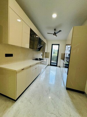 Kitchen in 4 BHK Builder Floor at Ansal Versalia Phase A2, Sector 67a – for Sale