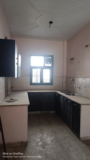 Kitchen in 3 BHK Builder Floor at Ashoka Enclave – for Sale