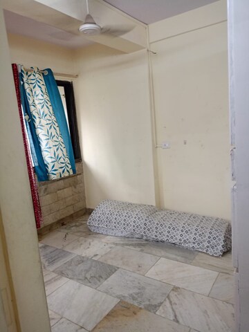 Bedroom in 1 BHK Apartment at New Pushpa Kunj CHS, Sion West – for Rent