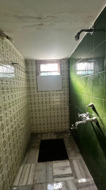 Bathroom in 1 BHK Apartment at New Pushpa Kunj CHS, Sion West – for Rent