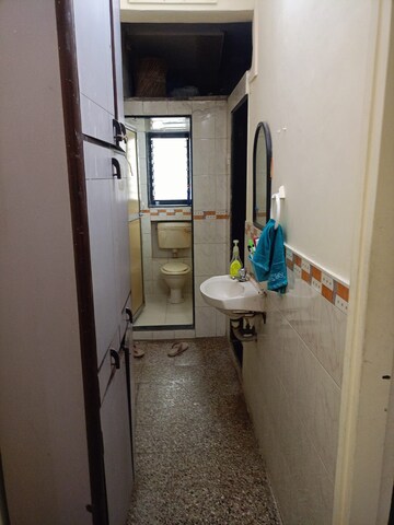 Bathroom in 1 BHK Apartment at New Pushpa Kunj CHS, Sion West – for Rent