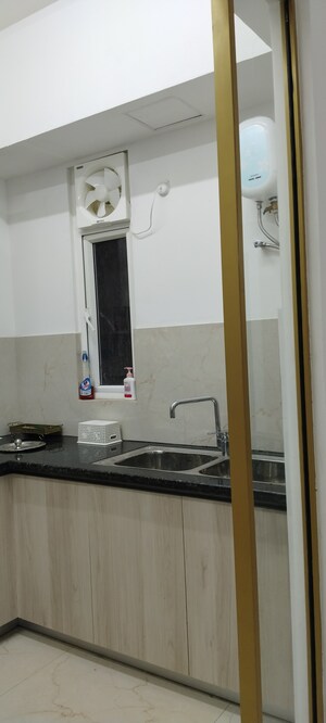 Kitchen in 3.5 BHK Builder Floor at Smart World Orchard, Sector 61 – for Sale