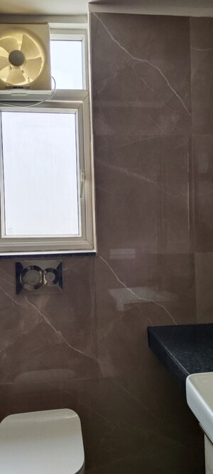 Bathroom in 3.5 BHK Builder Floor at Smart World Orchard, Sector 61 – for Sale