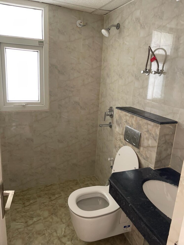 Bathroom, wave-executive-floors 2 Bedroom 900 Sq.Ft. Apartment In Wave City Ghaziabad 8695803
