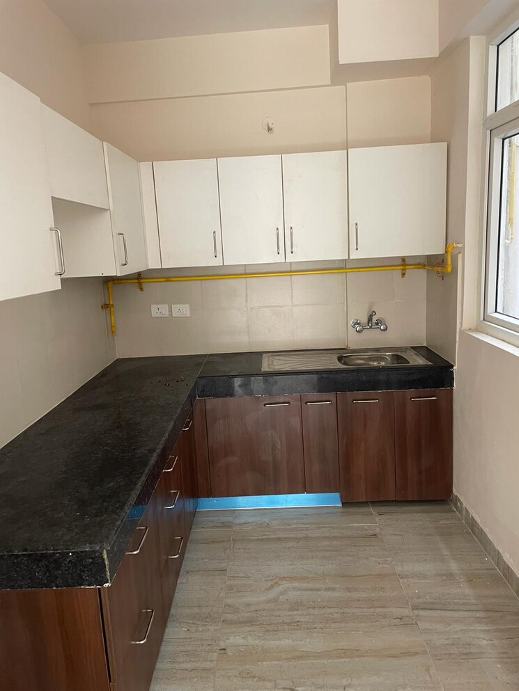 Kitchen, wave-executive-floors 2 Bedroom 900 Sq.Ft. Apartment In Wave City Ghaziabad 8695803