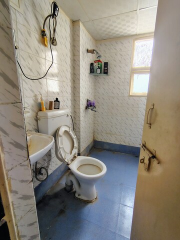 Bathroom in 2 BHK Apartment at Adore Happy Homes, Sector 86 – for Rent