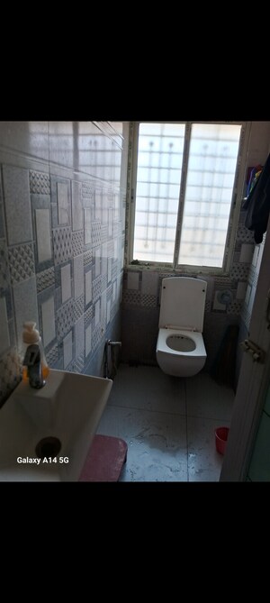 Bathroom in 1 BHK Apartment at Subhas Nagar – for Sale