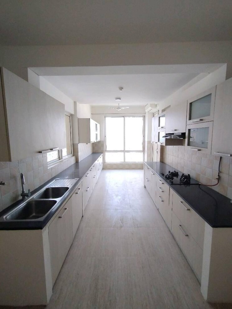 Kitchen, pioneer-park-presidia 5 Bedroom 4025 Sq.Ft. Apartment In Sector 62 Gurgaon 8695840