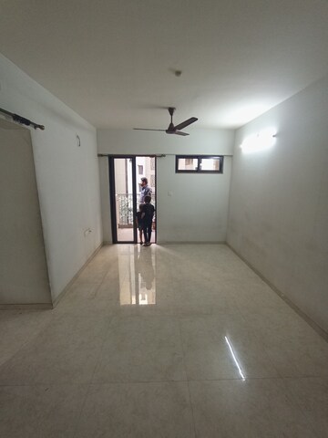 Living Room in 2 BHK Apartment at Lodha Lakeshore Greens, Dombivli East – for Rent