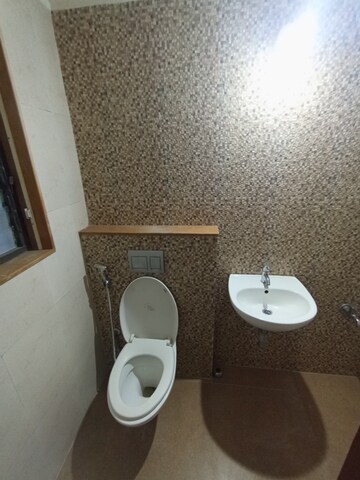 Bathroom in 2 BHK Apartment at Lodha Lakeshore Greens, Dombivli East – for Rent