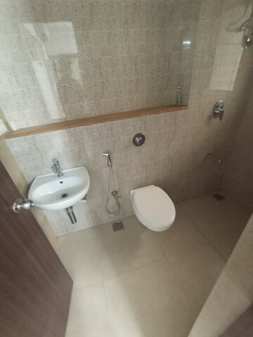 Bathroom in 2 BHK Apartment at Lodha Lakeshore Greens, Dombivli East – for Rent