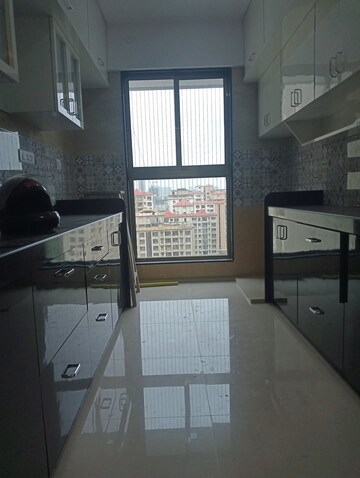 Kitchen in 2 BHK Apartment at Rajesh Raj Infinia, Malad West – for Rent