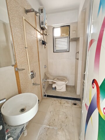 Bathroom in 3 BHK Apartment at Ghatkopar West – for Rent