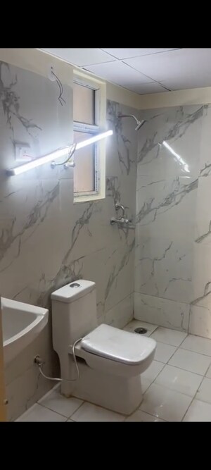 Bathroom in 3 BHK Apartment at JKG Palm Resort, Raj Nagar Extension – for Sale