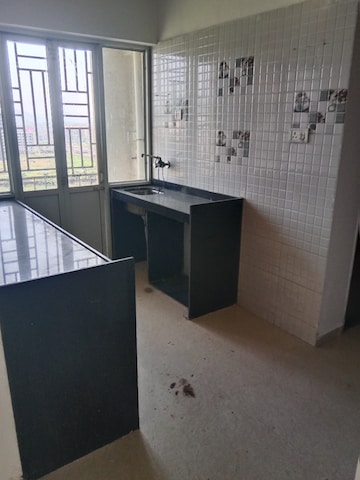 Kitchen in 1 BHK Apartment at JSB Nakshatra Greens, Naigaon East – for Sale