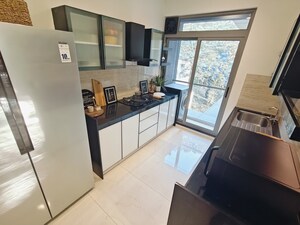 Kitchen in 3 BHK Apartment at Godrej Exquisite, Ghodbunder Road – for Sale