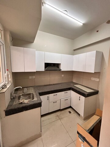 Kitchen in 2 BHK Apartment at Tata Eureka Park, Sector 150 – for Rent
