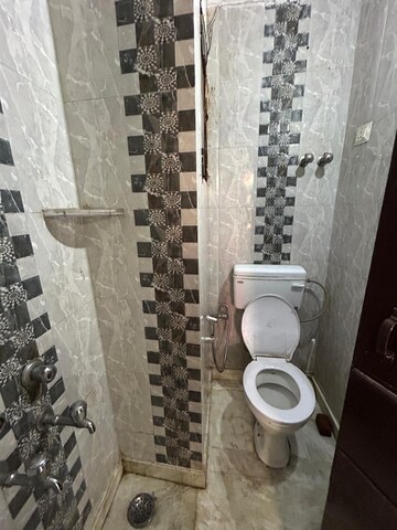 Bathroom in 2 BHK Builder Floor at Freedom Fighters Enclave – for Rent