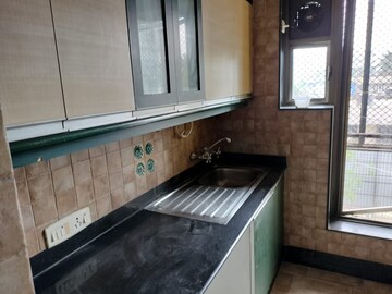 Kitchen in 3 BHK Apartment at Nirvana Apartment, Bandra West – for Rent