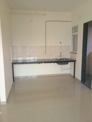 Kitchen in 1 BHK Apartment at Kolte Patil R10, Hinjewadi – for Rent