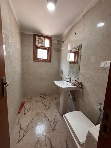 Bathroom in 1 BHK Apartment at Freedom Fighters Enclave – for Rent