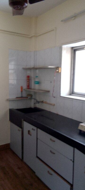 Kitchen in 1.5 BHK Apartment at Neumec Villa, Vile Parle East – for Rent