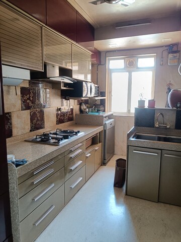 Kitchen in 3 BHK Apartment at Kamala Nav Natraj, Santacruz West – for Rent