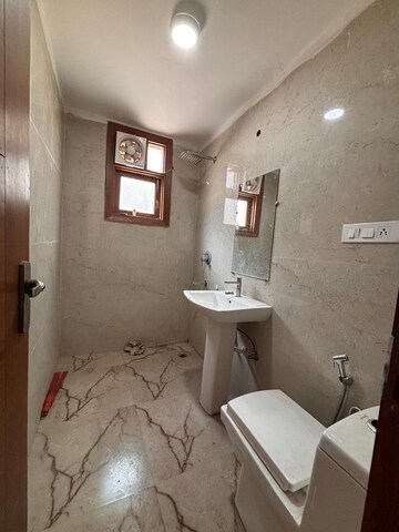 Bathroom in 3 BHK Builder Floor at Freedom Fighters Enclave – for Rent