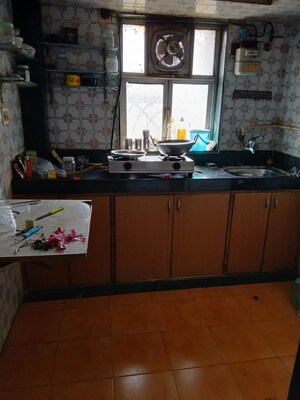 Kitchen in 2 BHK Apartment at Dipti Millenium Apartments, Andheri East – for Sale