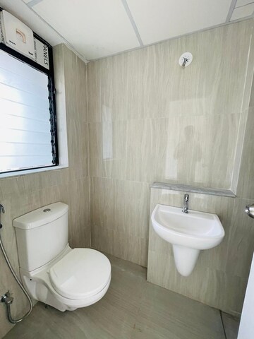 Bathroom in 3 BHK Apartment at Runwal Gardens, Dombivli East – for Rent