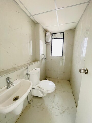 Bathroom in 3 BHK Apartment at Runwal Gardens, Dombivli East – for Rent