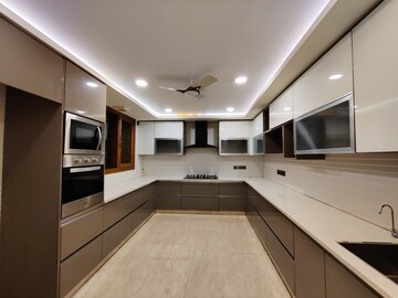 Kitchen in 5 BHK Apartment at Kailash Colony – for Sale