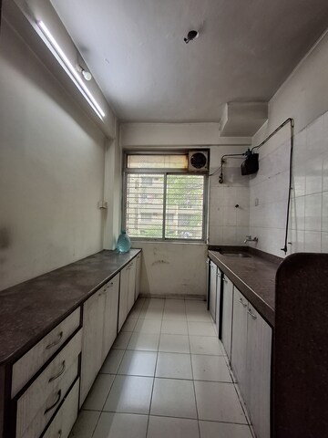 Kitchen in 2 BHK Apartment at Vasant Sagar, Kandivali East – for Rent
