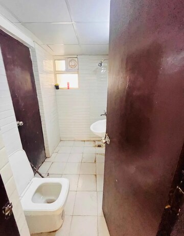 Bathroom in 2 BHK Apartment at Land Craft Golf Links Villa, Pandav Nagar – for Rent