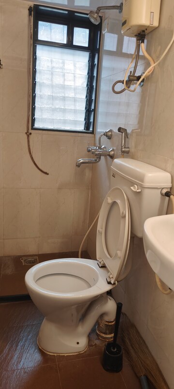 Bathroom in 1 BHK Apartment at Nutan Abhishek, Andheri West – for Rent