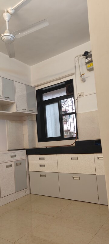 Kitchen in 1 BHK Apartment at Nutan Abhishek, Andheri West – for Rent