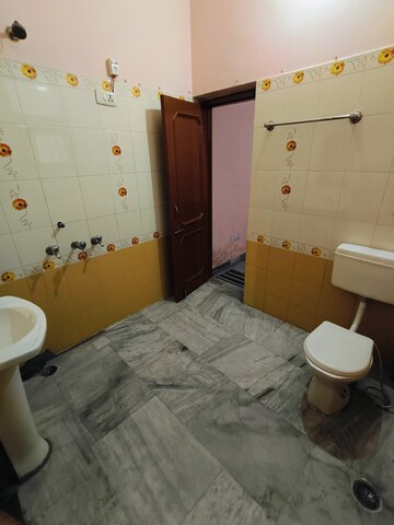 Bathroom in 2 BHK Apartment at Sunny Enclave – for Rent