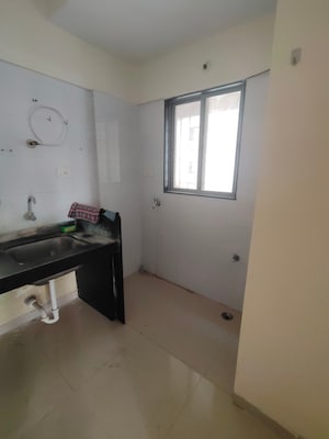 Kitchen in 2 BHK Apartment at Amit Astonia Classic, Undri – for Sale