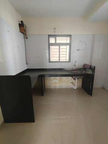 Kitchen in 2 BHK Apartment at Amit Astonia Classic, Undri – for Sale