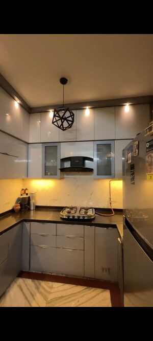 Kitchen in 3 BHK Builder Floor at Aman Plaza, Shakti Khand iv – for Sale