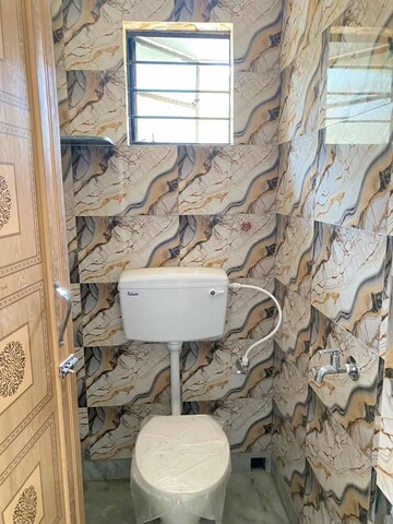 Bathroom in 3 BHK Apartment at Jaypee Greens Kosmos, Sector 134 – for Sale
