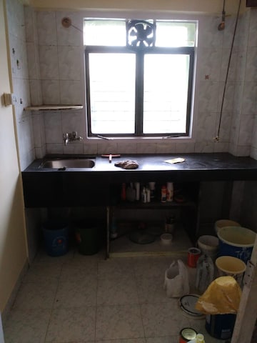 Kitchen in 1 BHK Apartment at Poonam Enclave, Goregaon East – for Rent