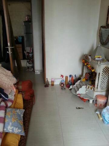 Living Room in 1 BHK Apartment at Poonam Enclave, Goregaon East – for Rent