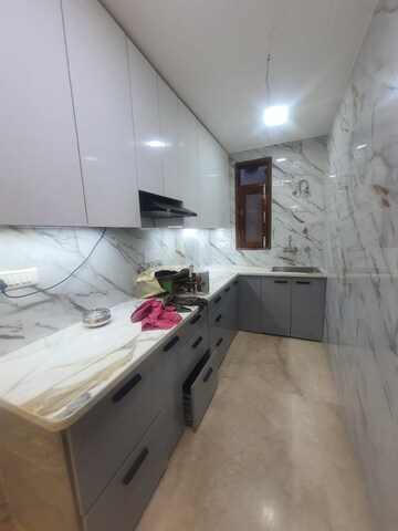 Kitchen in 3 BHK Apartment at Niti Khand I – for Rent
