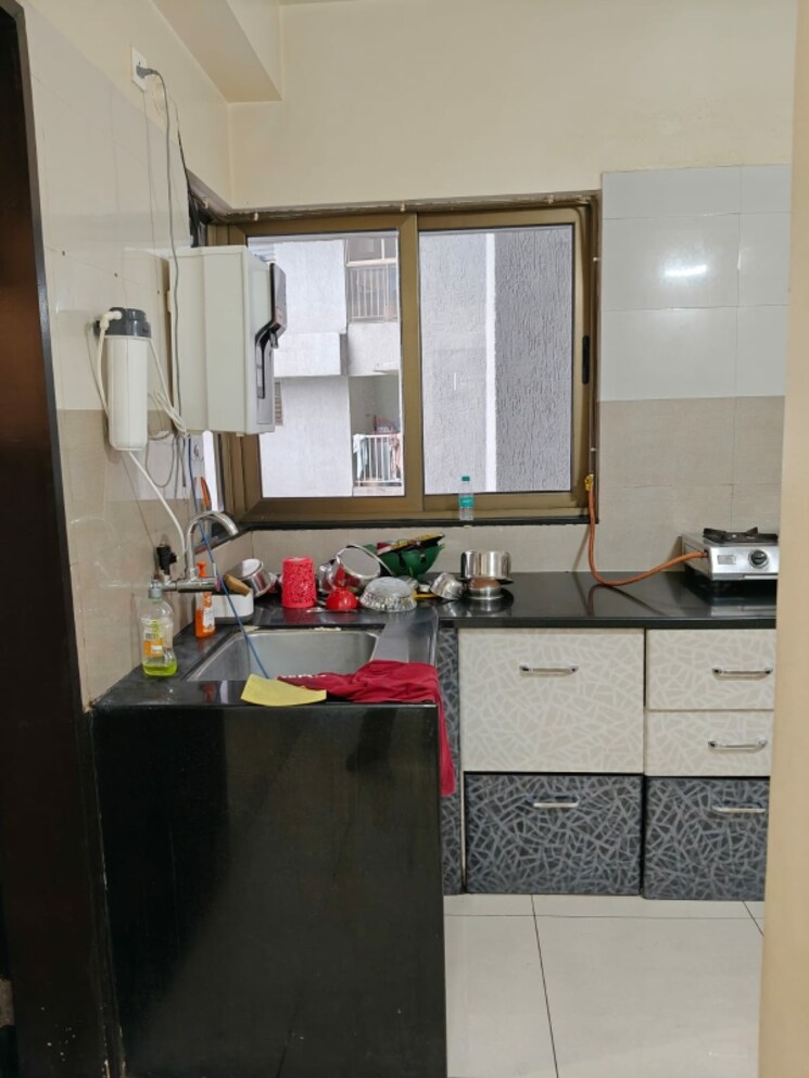 Kitchen, paranjape-blue-ridge 2 Bedroom 1050 Sq.Ft. Builder Floor In Hinjewadi Pune 8700019