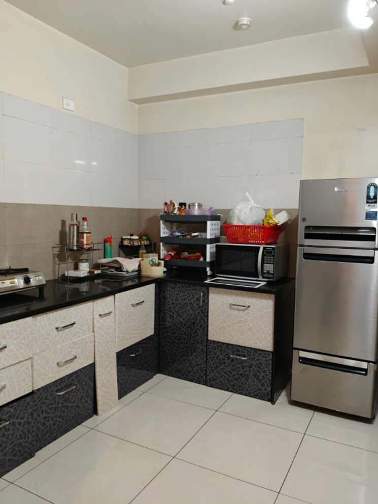 Kitchen, paranjape-blue-ridge 2 Bedroom 1050 Sq.Ft. Builder Floor In Hinjewadi Pune 8700019