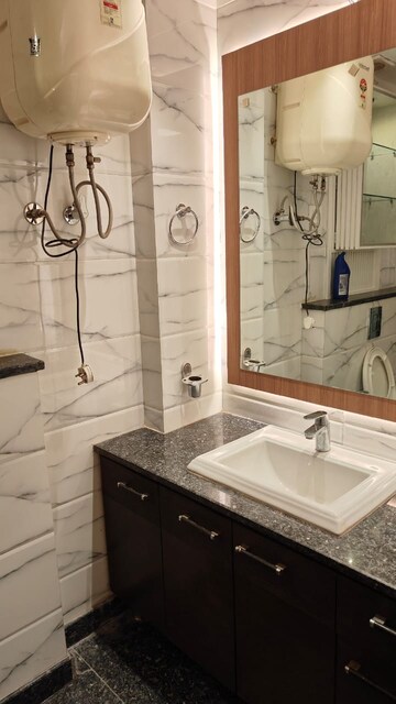 Bathroom in 3 BHK Apartment at Vasundhara Sector 1 – for Sale