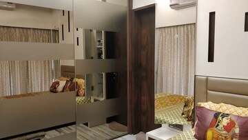 Living Room in 2 BHK Apartment at Runwal Greens, Mulund West – for Sale