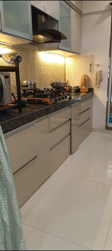 Kitchen in 2 BHK Apartment at Rustomjee Azziano Wing D, Majiwada – for Sale